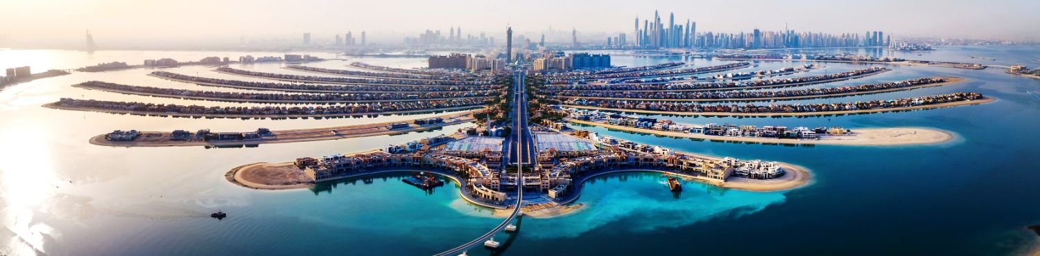 The Palm island panorama with Dubai marina in the background aerial